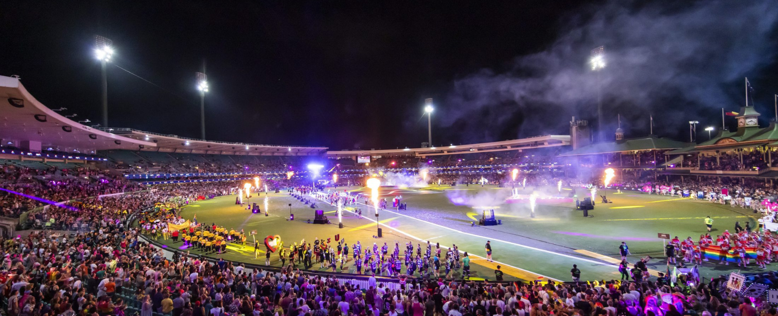 Stadium filled with people celebrating Mardi Gras Sydney