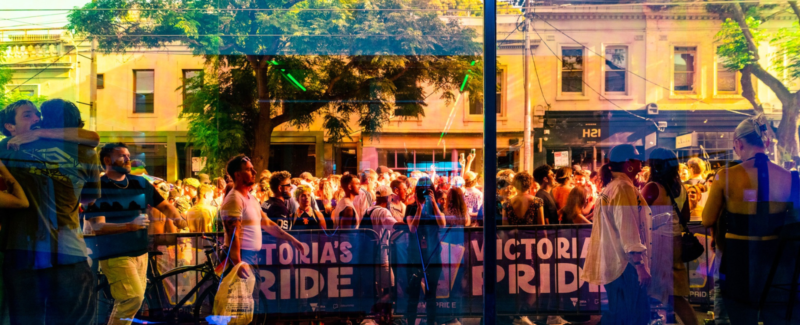 Street filled with people celebrating Melbourne Midsumma Festival