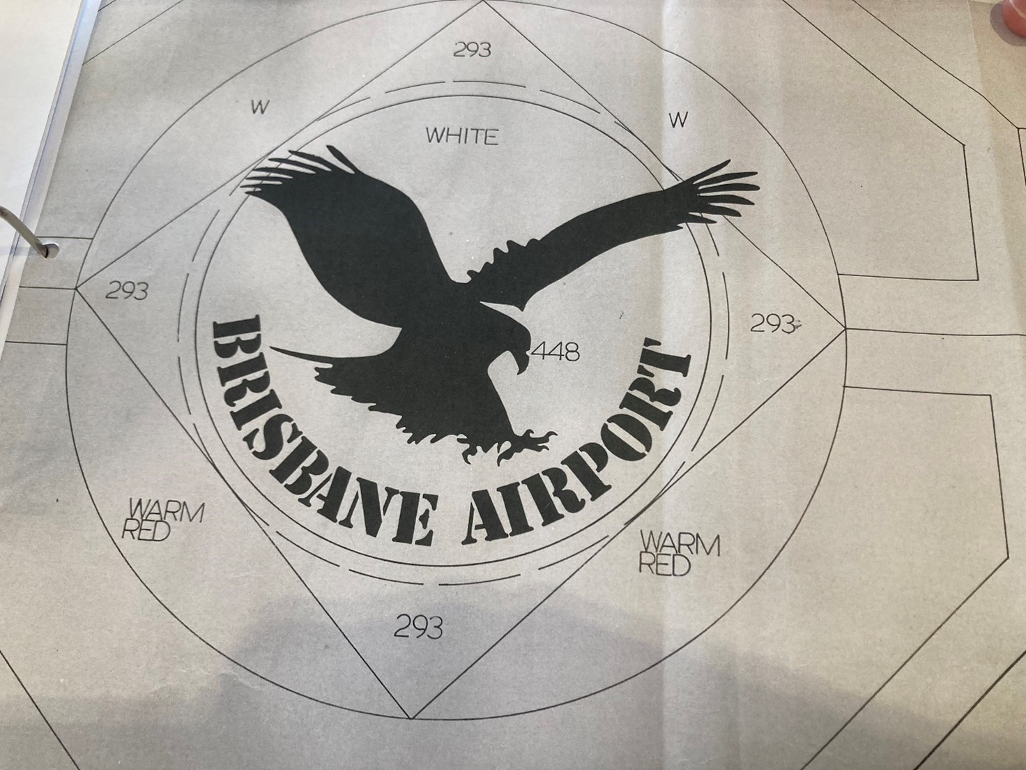 What could have been Brisbane Airport’s first logo, giving a nod to the airport’s founding at Eagle Farm.